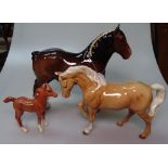 A Beswick Drayhorse, a Palomino pony and a foal