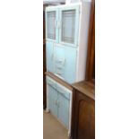 A Vintage painted maid saver cabinet, with fitted drawers, cupboards and sliding cupboard section to