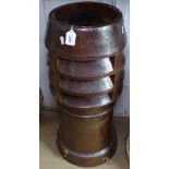 A brown glazed chimney pot, H74cm