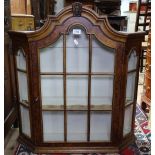 A Dutch oak and walnut hanging cabinet with glazed panelled door, W76cm, H80cm