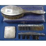 Cased 2-piece dressing table brush and comb set, silver cigarette box, and a silver-mounted comb