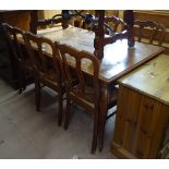 A Continental parquetry-topped oak draw leaf dining table, together with a set of 6 French oak and