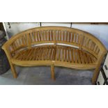 A teak banana garden bench, W160cm