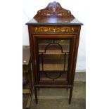 An Art Nouveau mahogany display cabinet, with single glazed door and floral marquetry decoration,