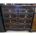 An 18th oak 2-section chest, with 2 short and 3 long drawers, moulded decoration, on bracket feet,