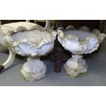 A pair of weathered and painted concrete garden urns, H45cm