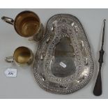 An Indian metal presentation dish, embossed with elephants, to Warrant Officer G. Eldridge from