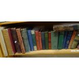 A collection of hardback books, an atlas, stamp catalogues, books etc