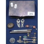 A small silver plated cigarette box containing a silver filigree box, a silver Viking pendant,