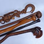2 carved Swazi African tribal wood walking sticks and 3 others (5)