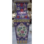 A Chinese purple ground porcelain square-section vase, with painted panels, height 46cm