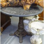 A circular marble-top table, raised on a turned cast-iron base, W85cm