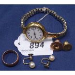 A lady's 18ct gold-cased wristwatch (including dust cover), an 18ct gold stud, a 9ct gold stud, a