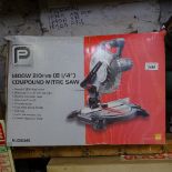 A Performance 1400w compound mitre saw, boxed