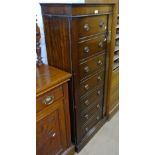 A steel gun cabinet in the form of a mahogany Wellington chest, for 6 rifles and keys, W59cm,
