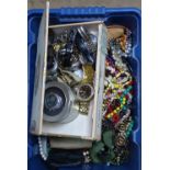 A large quantity of mixed costume jewellery, wristwatches etc