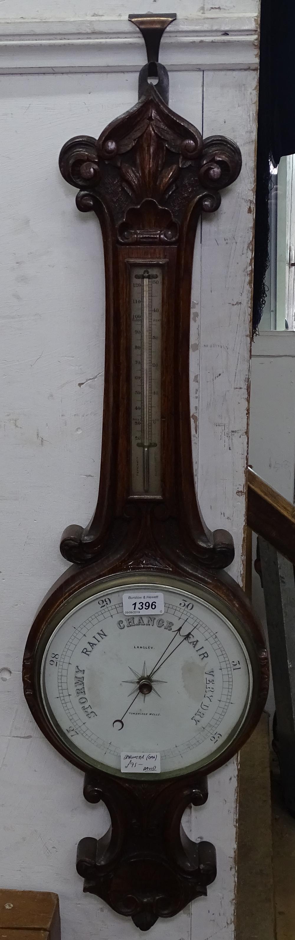 A Victorian carved oak aneroid barometer, by Langley of Tunbridge Wells, L83cm