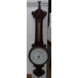 A Victorian carved oak aneroid barometer, by Langley of Tunbridge Wells, L83cm