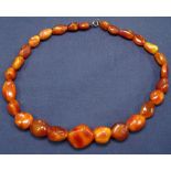 A Baltic amber and composite necklace