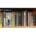 A shelf of folio editions, including Chaucer and John Donne