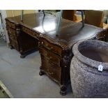 A large reproduction mahogany partners twin-pedestal writing desk, with 3 tooled leather inset