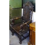 An ornate Victorian carved oak hall chair, W72cm, H140cm