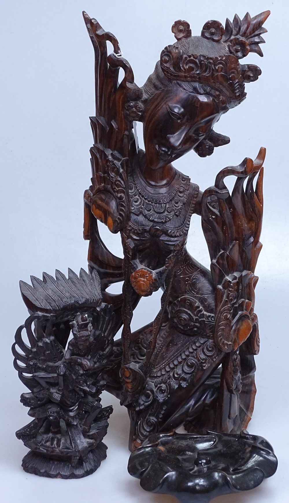 2 Eastern carved wood figures, tallest 19", and an Oriental carved wood stand