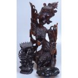 2 Eastern carved wood figures, tallest 19", and an Oriental carved wood stand