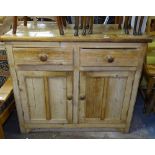 A pine and tile-top kitchen dresser base with fitted drawers and cupboards, W107cm