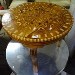 A circular walnut and rosewood inlaid occasional table, W60cm