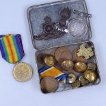 A tin of First World War medals, Regimental buttons etc