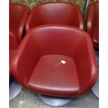 A pair of swivel Club chairs