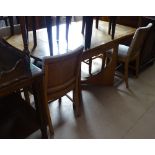 An Art Deco oak draw leaf dining table, together with a set of 4 matching upholstered chairs