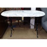 A white and grey veined oval marble-top garden table, with wrought-iron base, W120cm