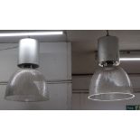 A pair of industrial light fittings