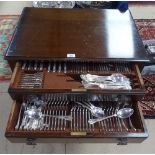 A collection of silver plated Kings pattern cutlery, in fitted 2-drawer cabinet