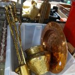 A brass companion set, a pot, and a copper dish