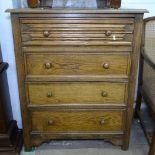 An Ipswich oak design narrow chest of 4 drawers