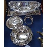 Silver plated fruit basket with pierced and embossed decoration, a rectangular 2-handled tea tray,
