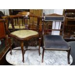 An Edwardian stained beech corner elbow chair, and a mahogany nursing chair (2)