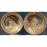 A pair of Antique painted pottery portraits titled La Toscana and La Sorrenlina, signed M S