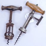 A Victorian patent corkscrew with painted turned-wood handle, and another corkscrew