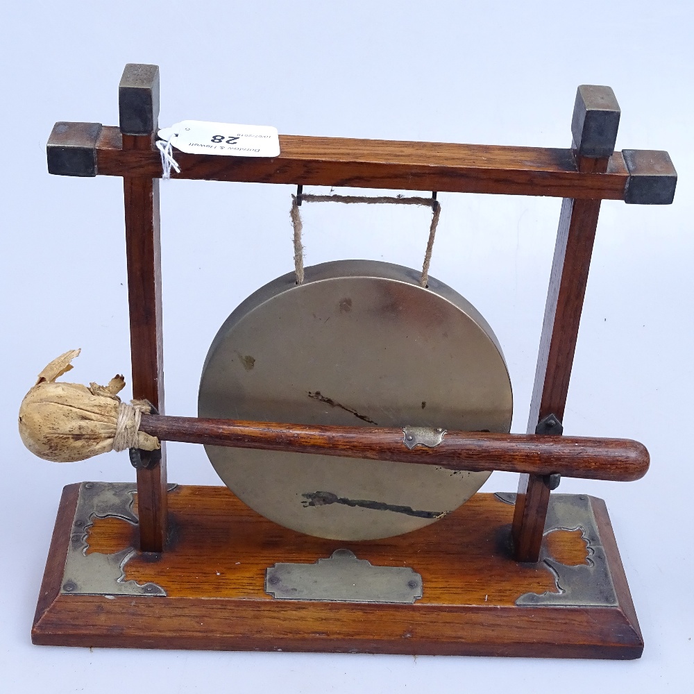 An Arts and Crafts oak gong with metal mounts, and striker, height 10.25" - Image 2 of 2