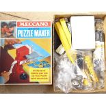 Meccano Puzzle Maker, and a box of Meccano