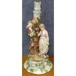 A Continental porcelain lamp base, surmounted by Classical figures, height 36cm