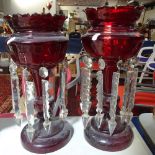 A pair of Edwardian ruby glass table lustres, with arrowhead drops, 13.75" approx