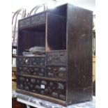 A Chinese elm table-top cabinet, with fitted drawers and cupboards, and applied stylised mounts,