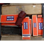 Boxed Lionel trains, track, tender, and caboose etc