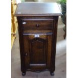 A French oak bedside cupboard with panel door, W35cm