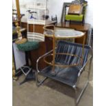 An oval 2-tier drinks trolley, a machinist's stool, a chrome low armchair etc